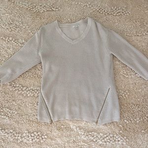 oatmeal sweater with gold zippers
